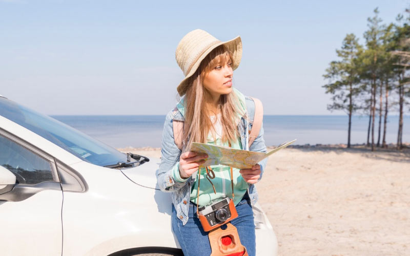 solo female traveller driving to the beach, car hire, July 2024, Australia